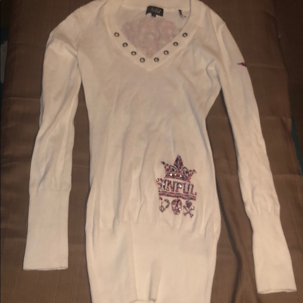 Sinful Sweater size medium